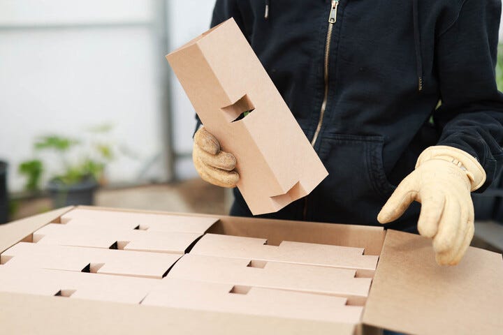 Boxes designed to cradle plants during shipping